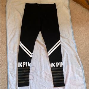 Black leggings with camo stripes at the bottom